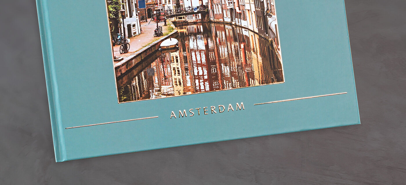 gold highlighted text on the cover of a travel photobook